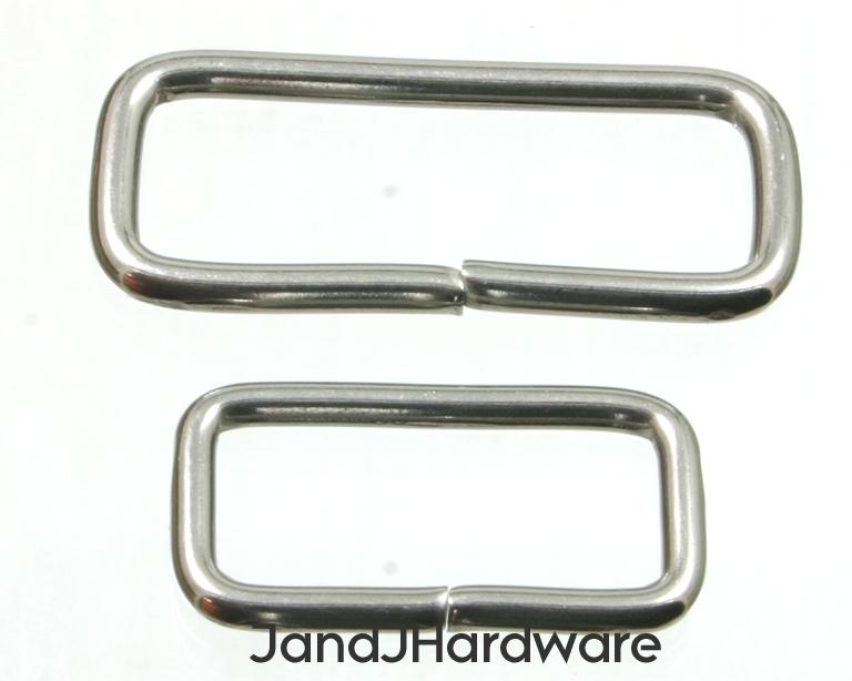 2 solid stainless steel loops or belt keepers in 1 and 1 1/2 inch widths.